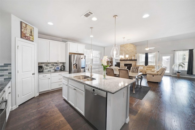 132 Mossy Oak Trl, Fort Worth, TX 76131 - french country home featuring a front yard, board and batten siding, brick siding, concrete driveway, and an attached garage