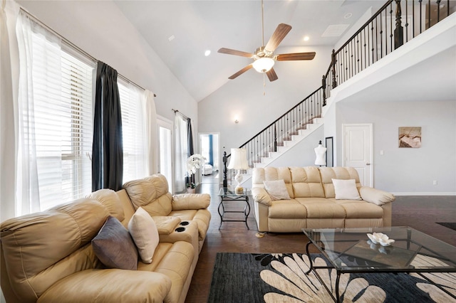 living area with baseboards, stairs, recessed lighting, high vaulted ceiling, and a ceiling fan