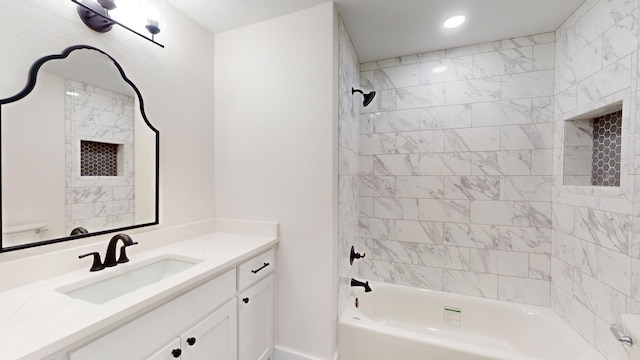 bathroom featuring recessed lighting, toilet, vanity, and shower / tub combination