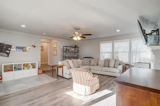 living room with recessed lighting, wood finished floors, and ceiling fan