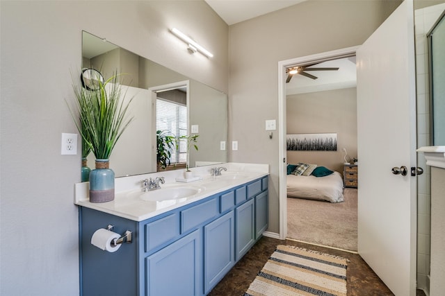 full bath with a sink, double vanity, a ceiling fan, and connected bathroom