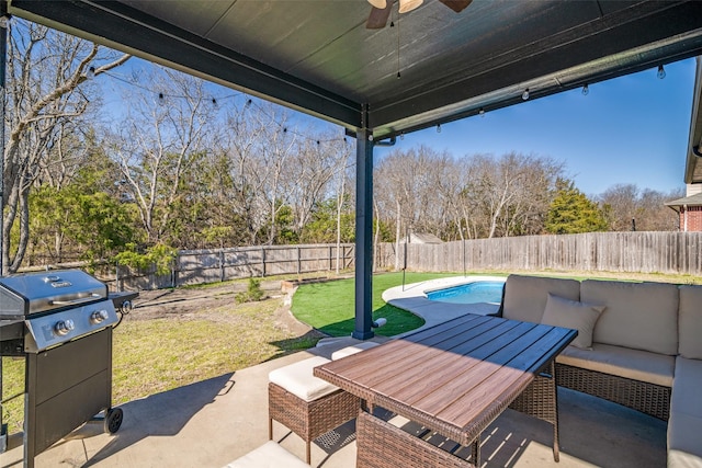 2212 River Birch Ln, Rockwall, TX 75032 - view of patio featuring a ceiling fan, area for grilling, an outdoor hangout area, and view of wooded area