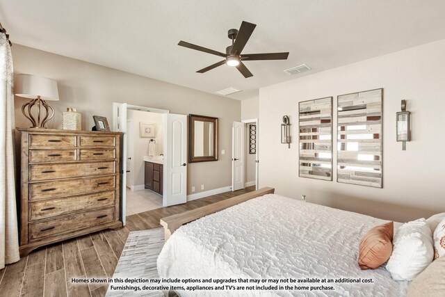 bedroom featuring visible vents, ensuite bathroom, wood finished floors, baseboards, and ceiling fan