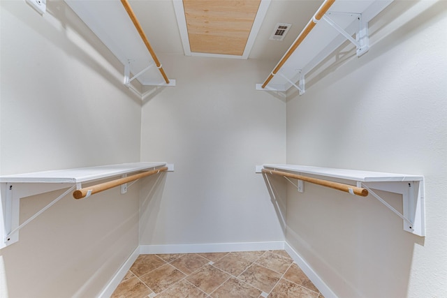 walk in closet with visible vents