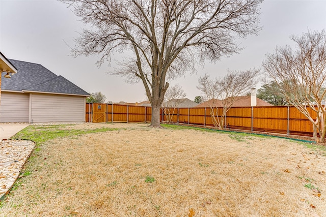 view of yard featuring a fenced backyard