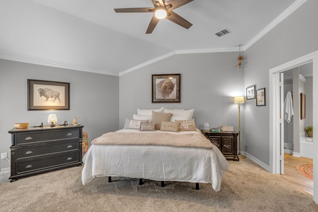 bedroom featuring visible vents, lofted ceiling, ornamental molding, carpet flooring, and baseboards