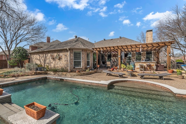 pool featuring a patio, fence, a pergola, and outdoor dry bar