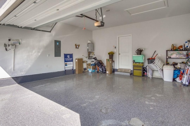 garage with electric panel, a garage door opener, and water heater