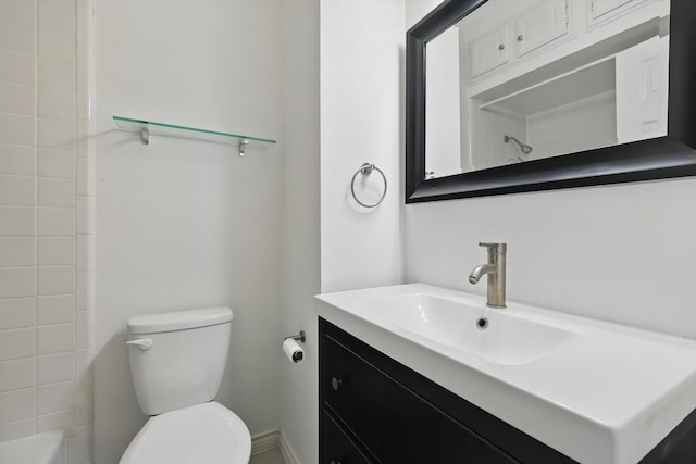 bathroom with toilet and vanity