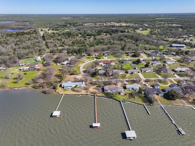 birds eye view of property with a residential view and a water view