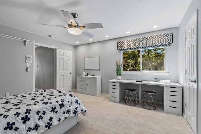 bedroom with a ceiling fan, recessed lighting, and light colored carpet