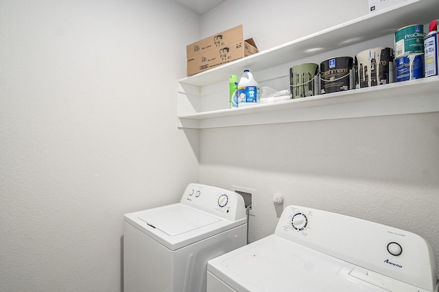 laundry room featuring laundry area and washing machine and clothes dryer