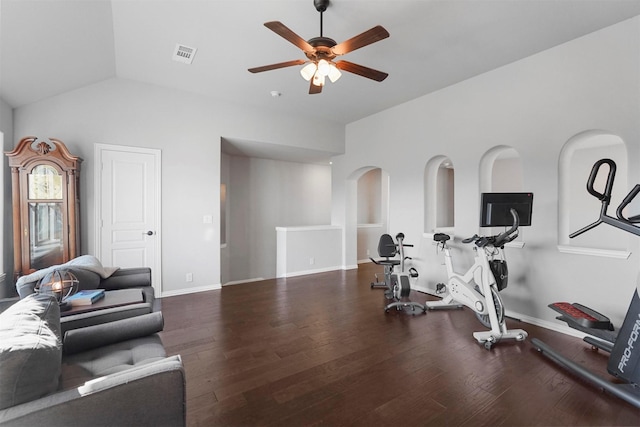 workout room featuring visible vents, baseboards, a ceiling fan, and wood finished floors