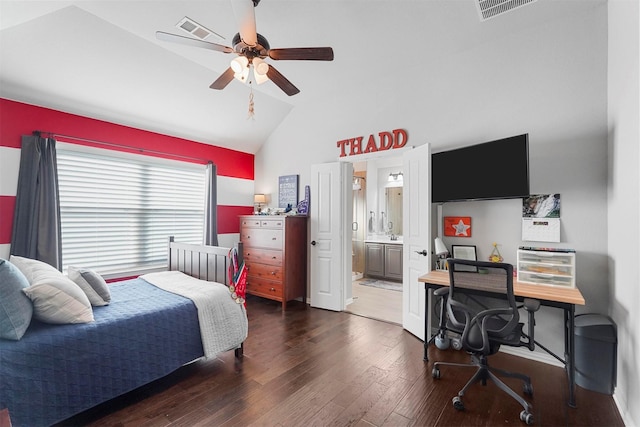 bedroom with lofted ceiling, wood finished floors, visible vents, and ensuite bathroom