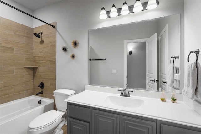 bathroom featuring shower / bath combination, toilet, and vanity