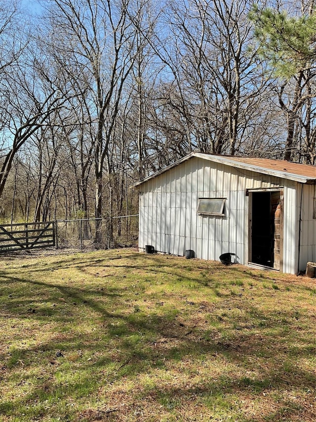 view of outdoor structure with an outdoor structure and fence