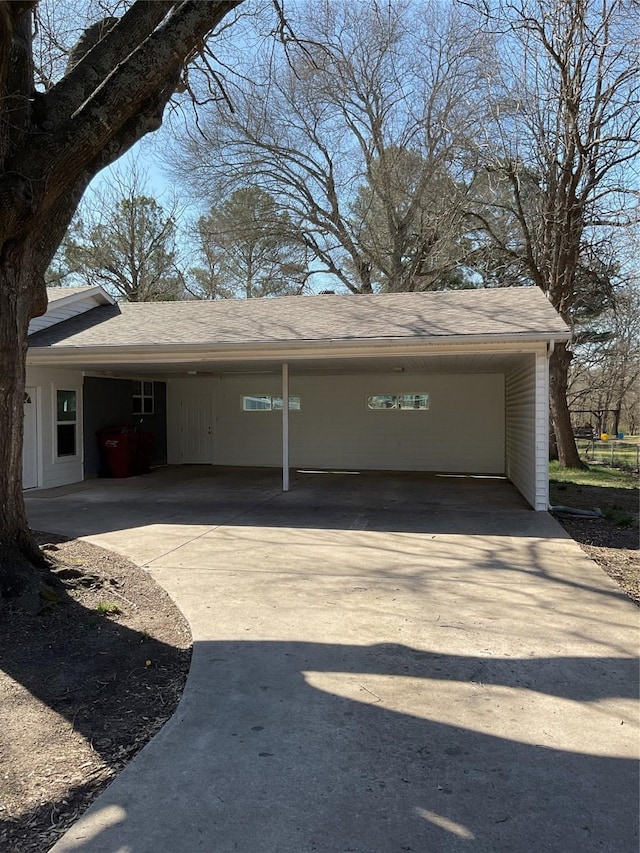 garage featuring driveway