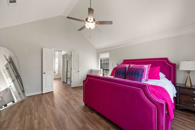 bedroom with a ceiling fan, lofted ceiling, wood finished floors, and baseboards