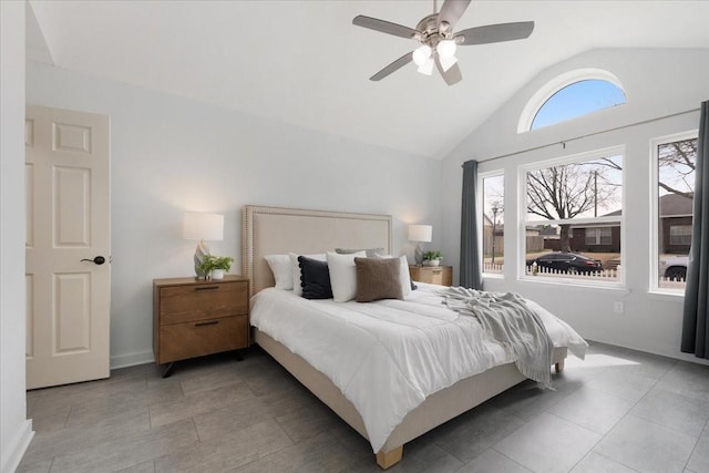 bedroom featuring vaulted ceiling and a ceiling fan