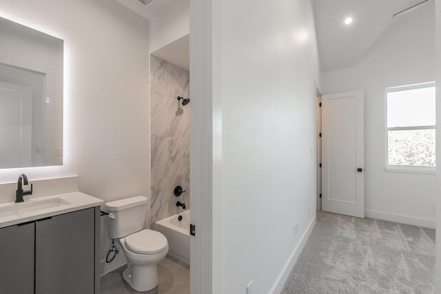 bathroom featuring visible vents, toilet, vanity, baseboards, and shower / bathtub combination