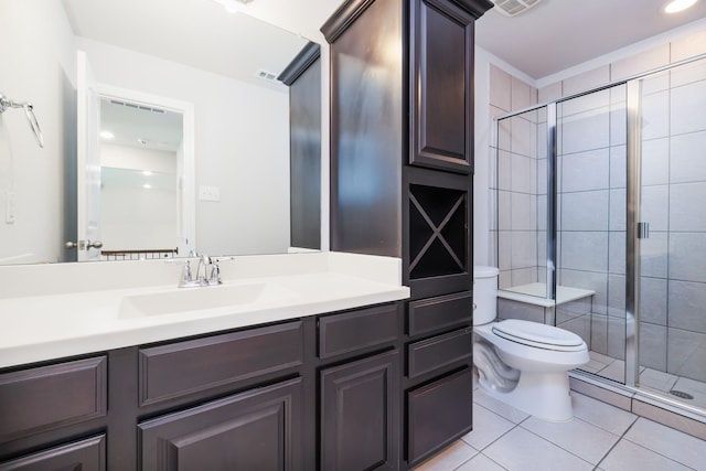 full bathroom featuring tile patterned flooring, visible vents, a shower stall, toilet, and vanity