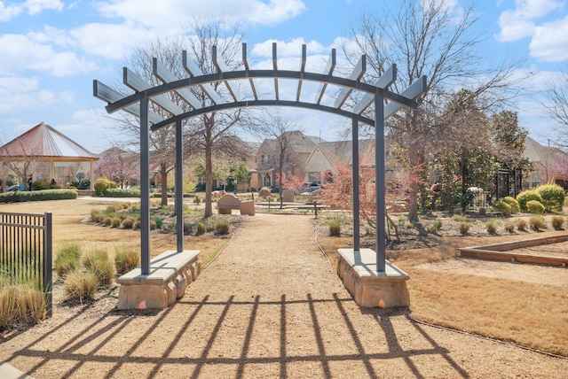 surrounding community featuring a gazebo and fence