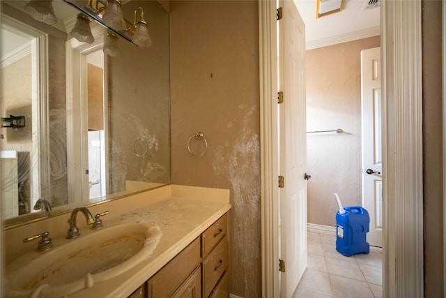 bathroom with vanity, tile patterned floors, visible vents, and ornamental molding