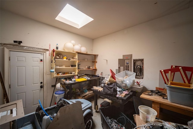 misc room featuring electric panel and a skylight