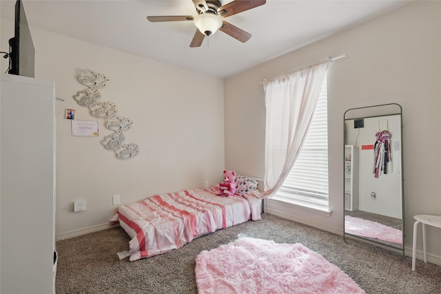 bedroom with baseboards, carpet floors, and ceiling fan