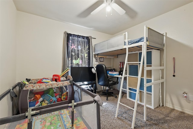 carpeted bedroom featuring baseboards