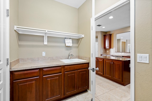 bathroom featuring visible vents, backsplash, recessed lighting, tile patterned flooring, and vanity