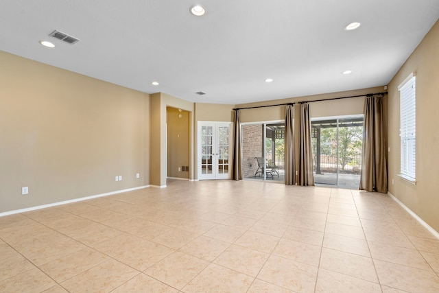 spare room with recessed lighting, visible vents, baseboards, and light tile patterned flooring