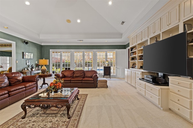 living room with visible vents, light colored carpet, high vaulted ceiling, and ornamental molding