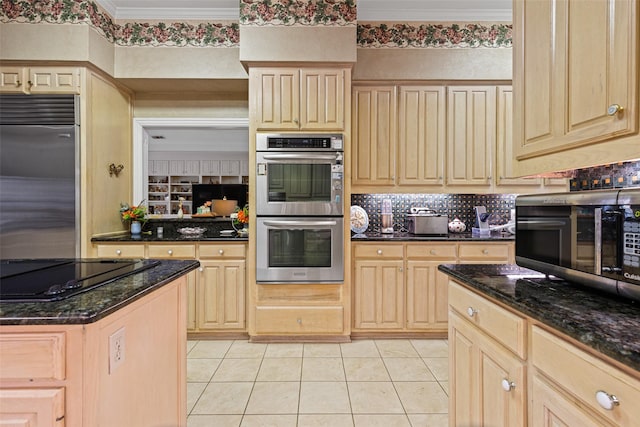 kitchen with light tile patterned floors, light brown cabinetry, appliances with stainless steel finishes, crown molding, and tasteful backsplash