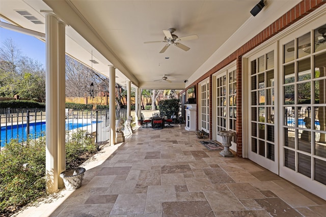 view of patio / terrace with visible vents, a fenced in pool, fence, french doors, and a ceiling fan