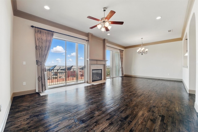 unfurnished living room with crown molding, wood finished floors, and a fireplace