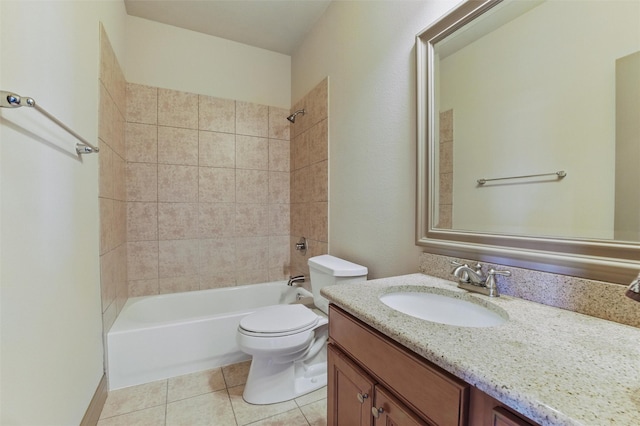 bathroom featuring vanity, tile patterned floors, toilet, and bathtub / shower combination