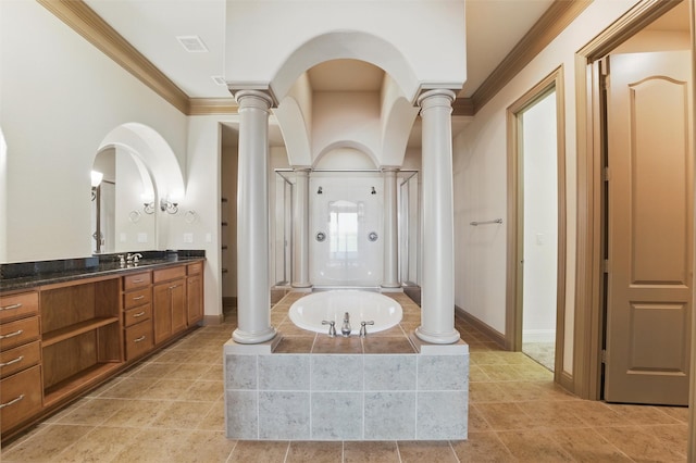 full bath with a shower stall, crown molding, a bath, vanity, and ornate columns