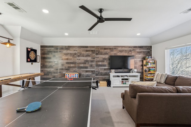 rec room featuring recessed lighting, visible vents, an accent wall, and a ceiling fan