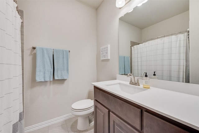 full bath with baseboards, toilet, a shower with shower curtain, tile patterned floors, and vanity