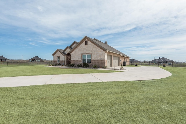 view of home's exterior featuring a garage, a lawn, concrete driveway, and fence