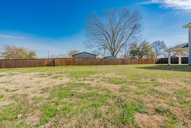 view of yard featuring fence