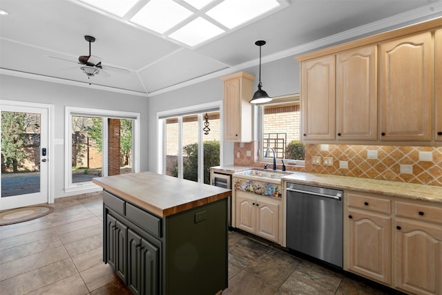 kitchen with light brown cabinets, dishwasher, decorative backsplash, wood counters, and a sink