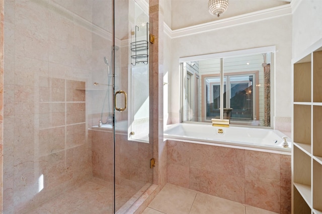 bathroom featuring a bath, a shower stall, and tile patterned flooring