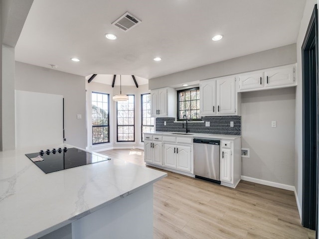 kitchen with visible vents, a sink, dishwasher, black electric cooktop, and tasteful backsplash