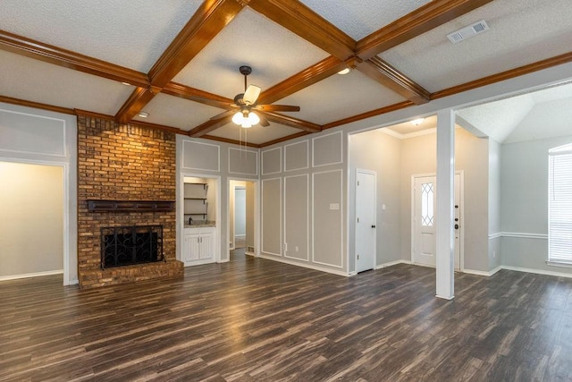 unfurnished living room featuring coffered ceiling, visible vents, a fireplace, and dark wood-type flooring