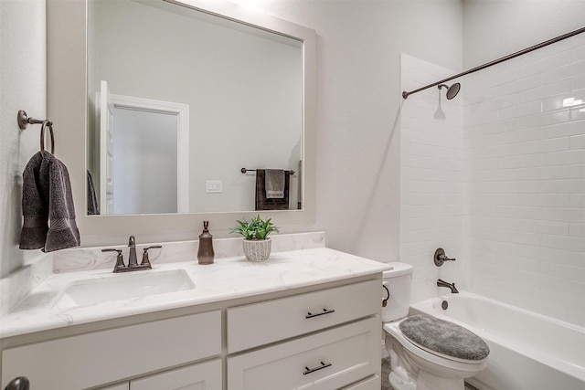 full bath featuring toilet, vanity, and  shower combination