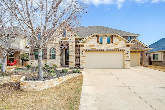 view of front of house featuring concrete driveway, stone siding, and roof with shingles