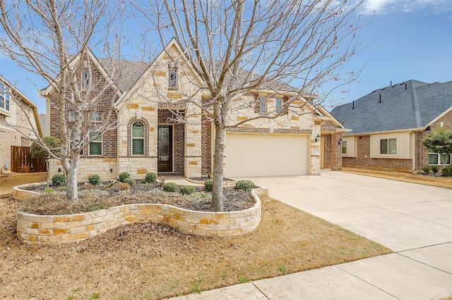 view of front of house with stone siding, brick siding, and driveway