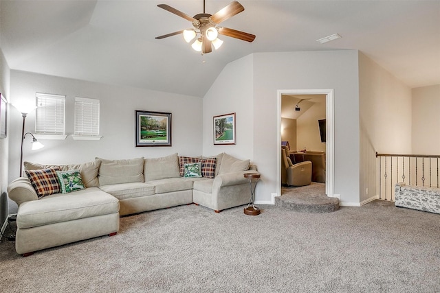 living room featuring ceiling fan, baseboards, lofted ceiling, and carpet floors